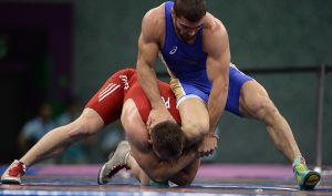 Мужской спорт: тяжелая атлетика и борьба